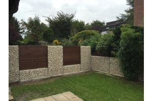 Steenkorf Schutting met Yellow Sun – Yellow Sun breukstenen inspiratie. Steenkorf Schutting met Yellow Sun
